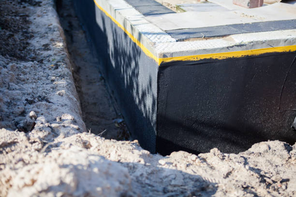 Professional Waterproofing technician working in Bremen, AL